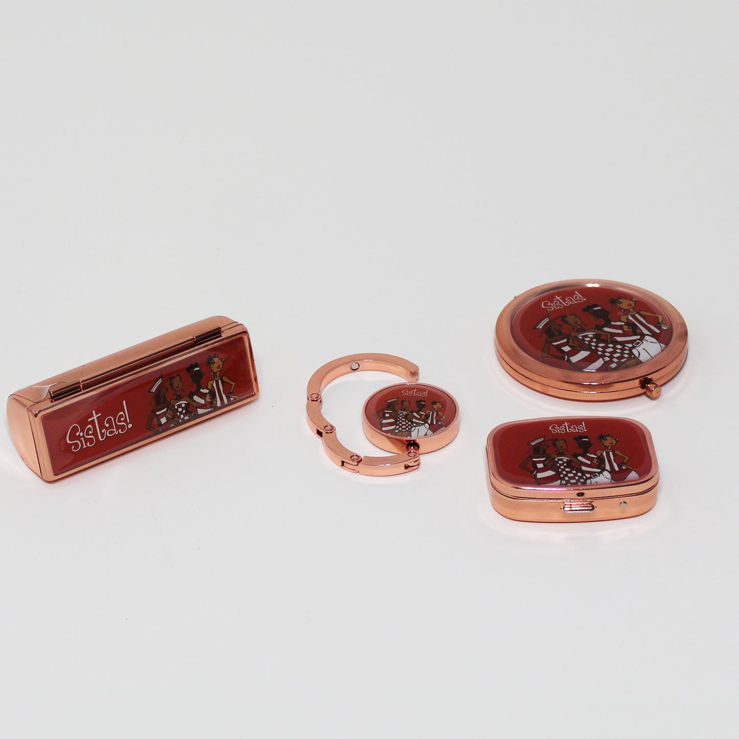 Red Sista's Purse Accessory Set lipstick case, pillbox, face mirror, and pill box.