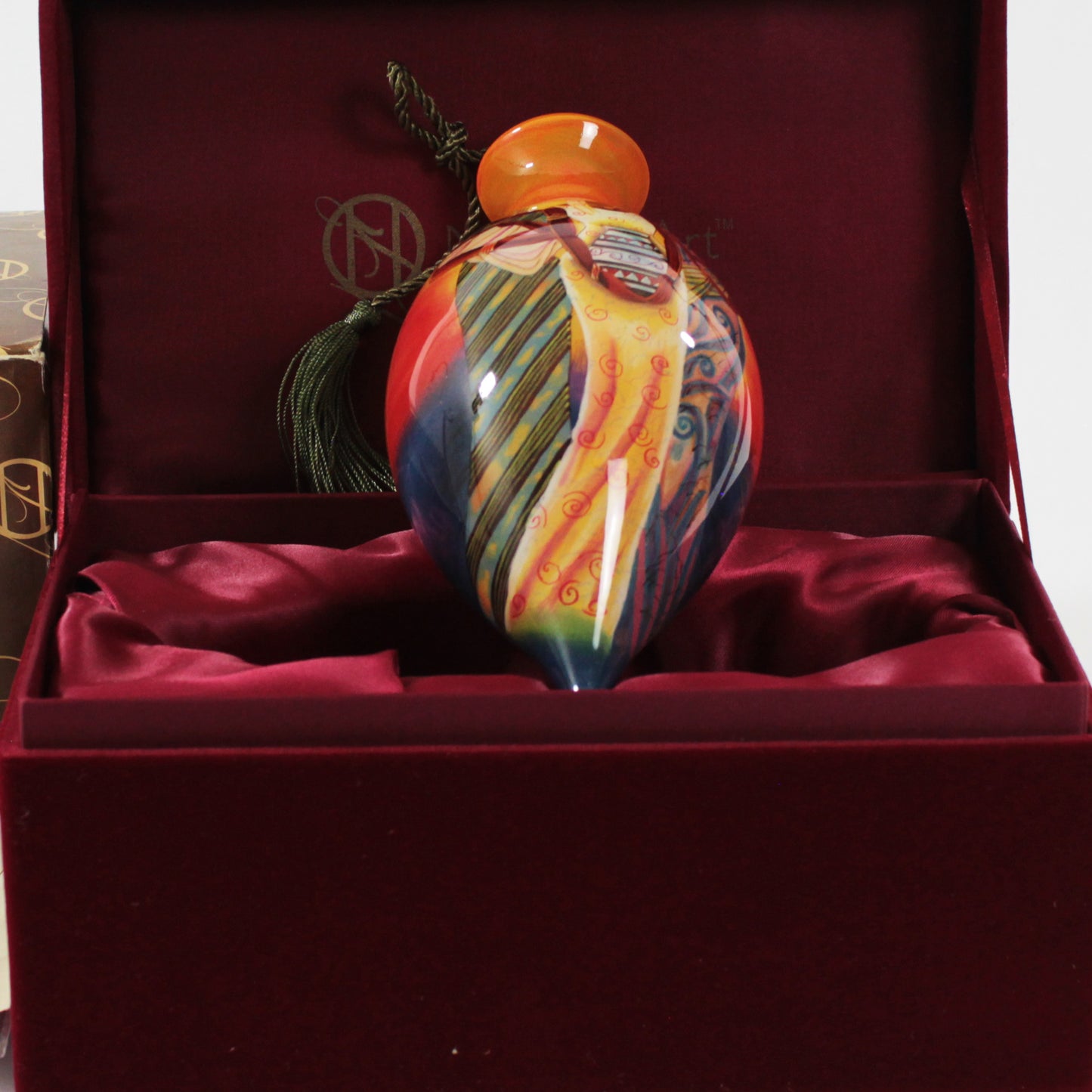 Sisters of the Sun Ne'Qwa Art Glass Ornament by Keith Mallett closeup