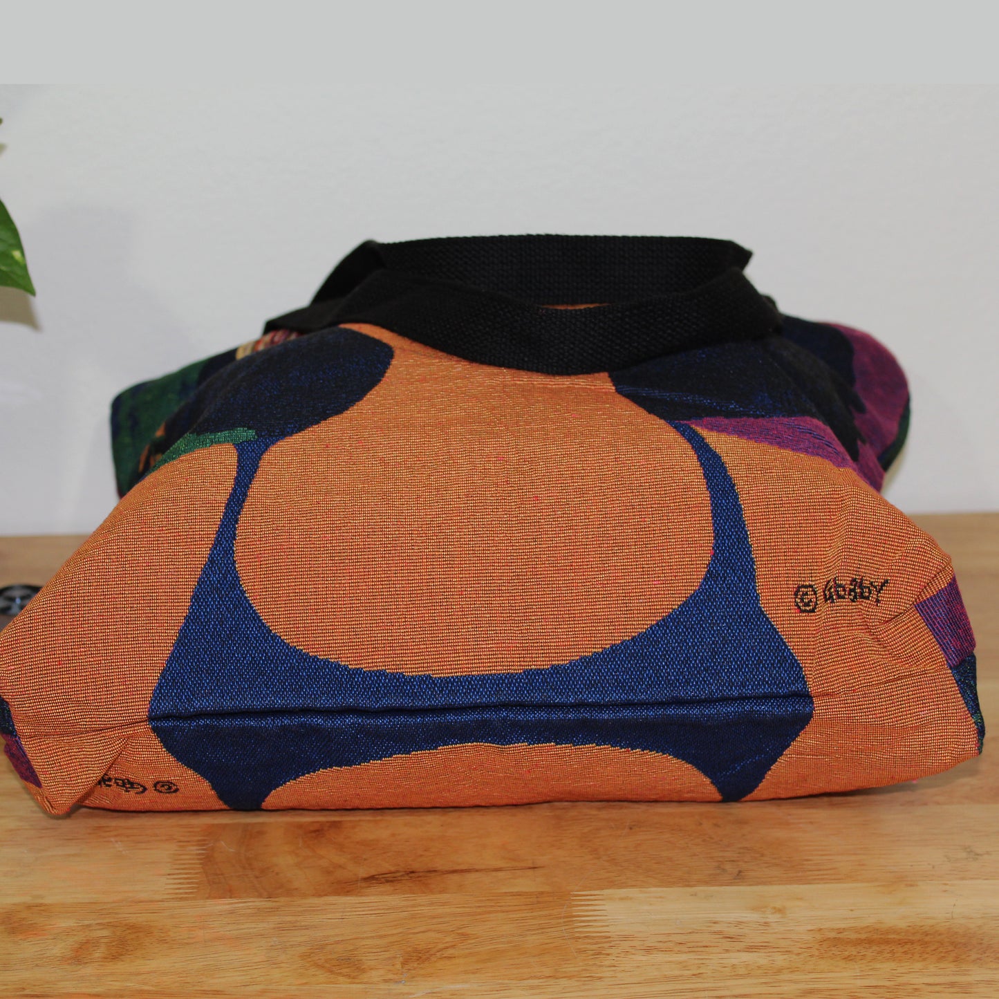 Believe, Blossom & Become Woven Tote bottom of bag