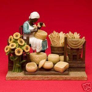 Weavin' Sunshine Figurine Annie Lee - front on red backdrop