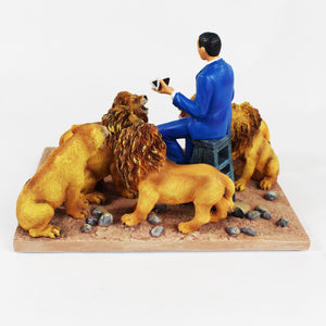 President Obama In The Lion's Den figurine. President sitting on a stump surrounded by six fierce lions - rear