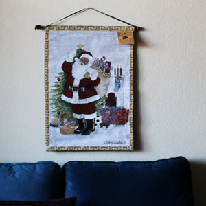 Black Santa Greeting Wall Hanging in living room