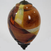 Load image into Gallery viewer, Jammin Ne&#39;Qwa Art Glass Ornament by Keith Mallett hanging back
