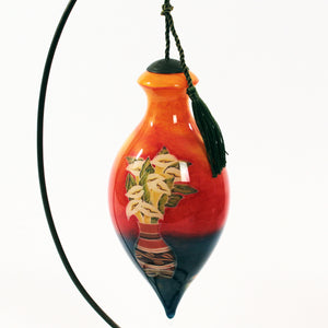 Sisters of the Sun Ne'Qwa Art Glass Ornament by Keith Mallett hanging back