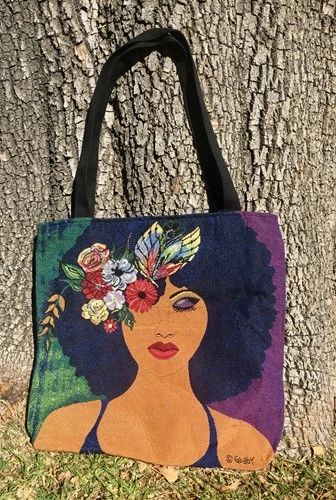 Believe, Blossom & Become Woven Tote against a tree